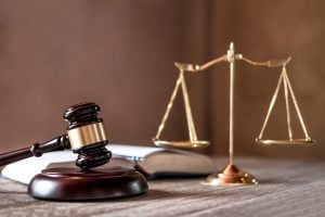 scales-justice-gavel-wooden-table-agreement-courtroom